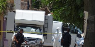 ENCUENTRAN CADÁVER EN CAMIONETA EN LAS AMÉRICAS