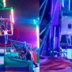 (VIDEO) QUEDA COLGANDO DE JUEGO MECÁNICO… Y CAE EN PLENA FERIA